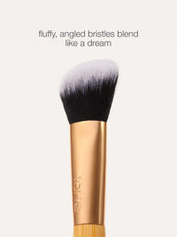 concealer paw brush - angled for seamless application